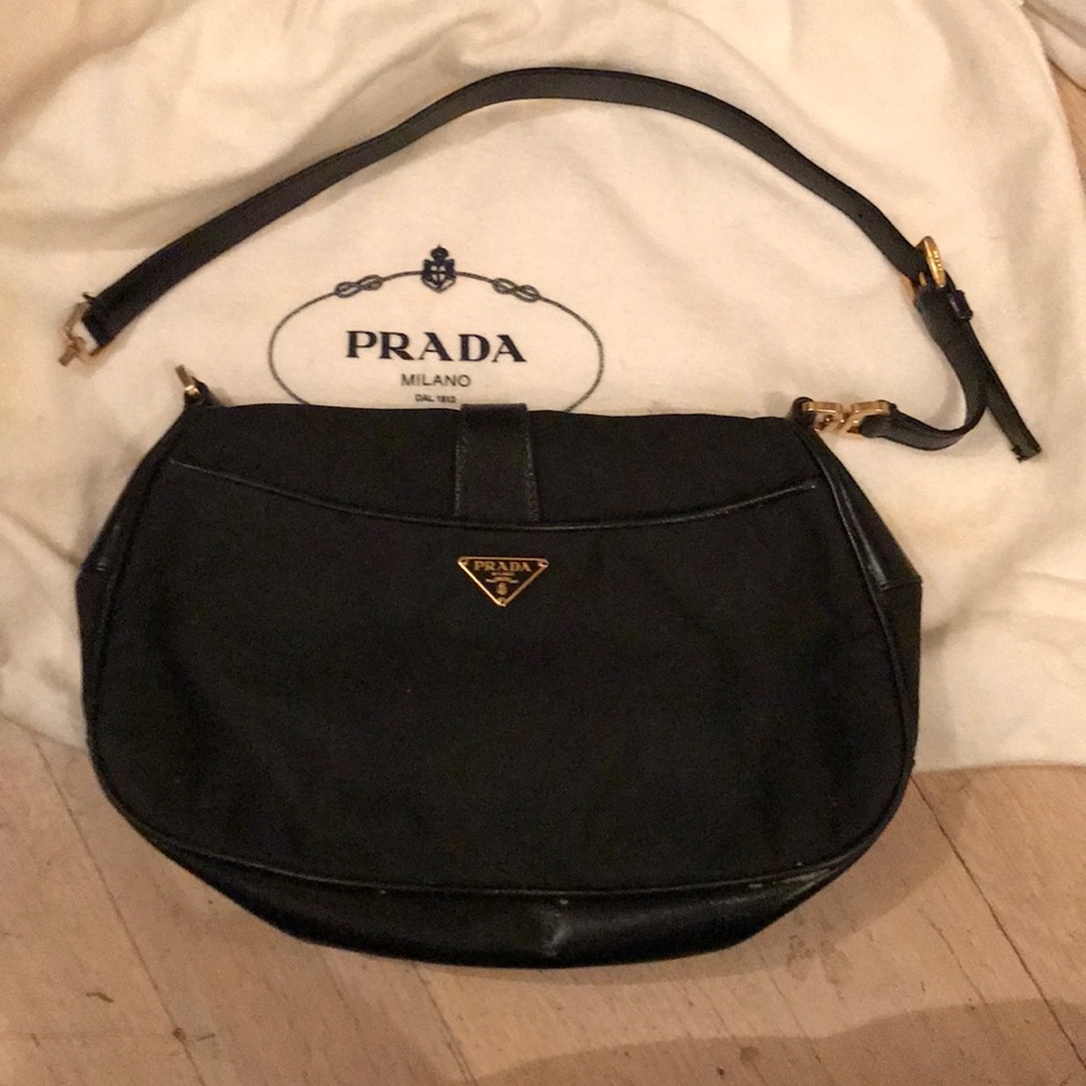 Black Prada Purse some damages, leather strap